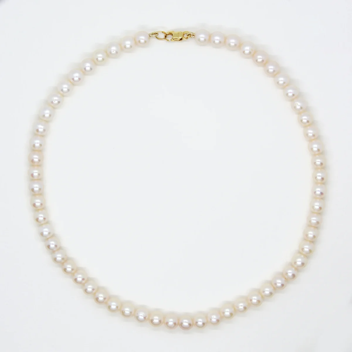 สร้อยคอไข่มุกน้ำจืดแท้ สีขาว 7mm. ยาว 16 นิ้ว ตัวล็อคทองคำแท้18k