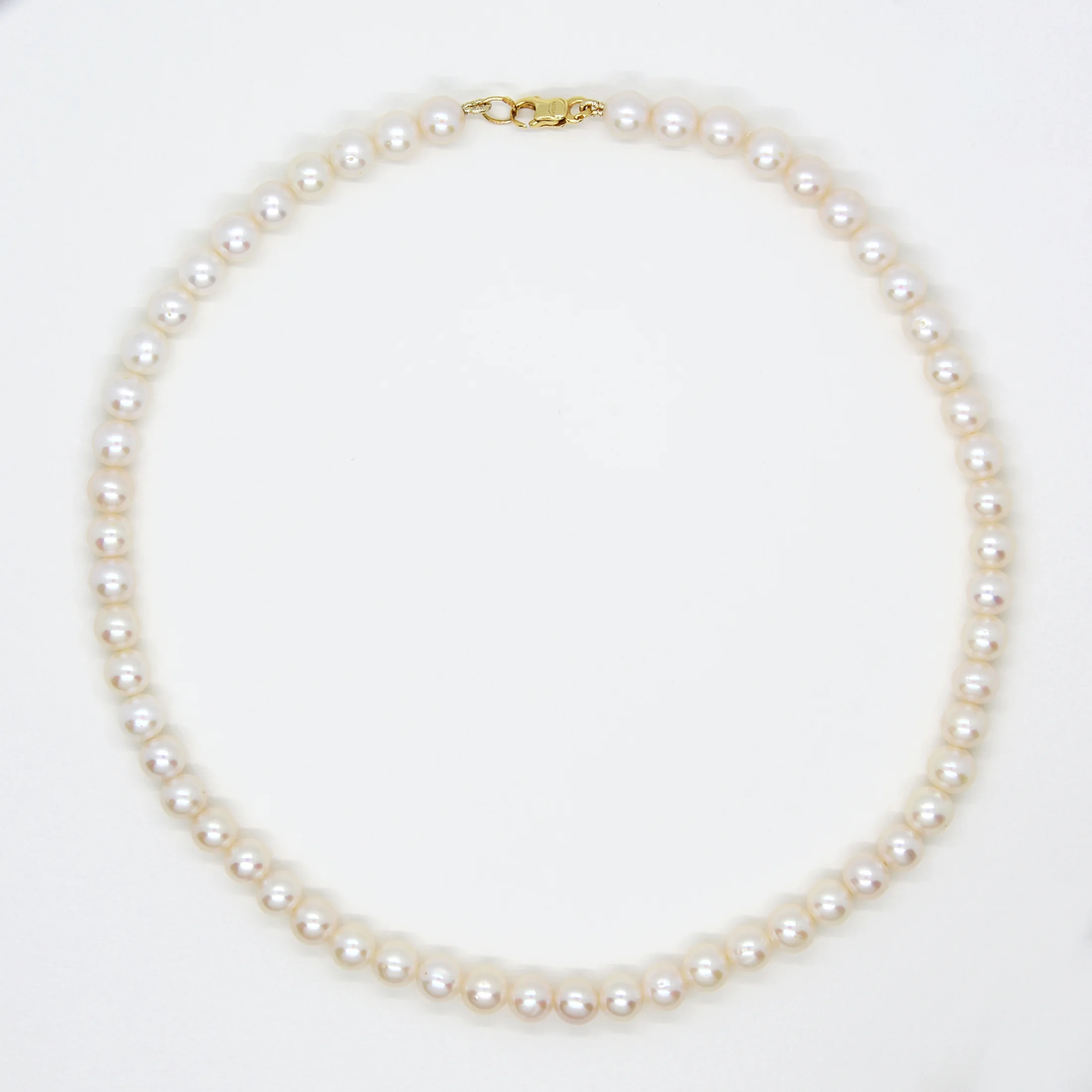 สร้อยคอไข่มุกน้ำจืดแท้ สีขาว 7mm. ยาว 16 นิ้ว ตัวล็อคทองคำแท้18k