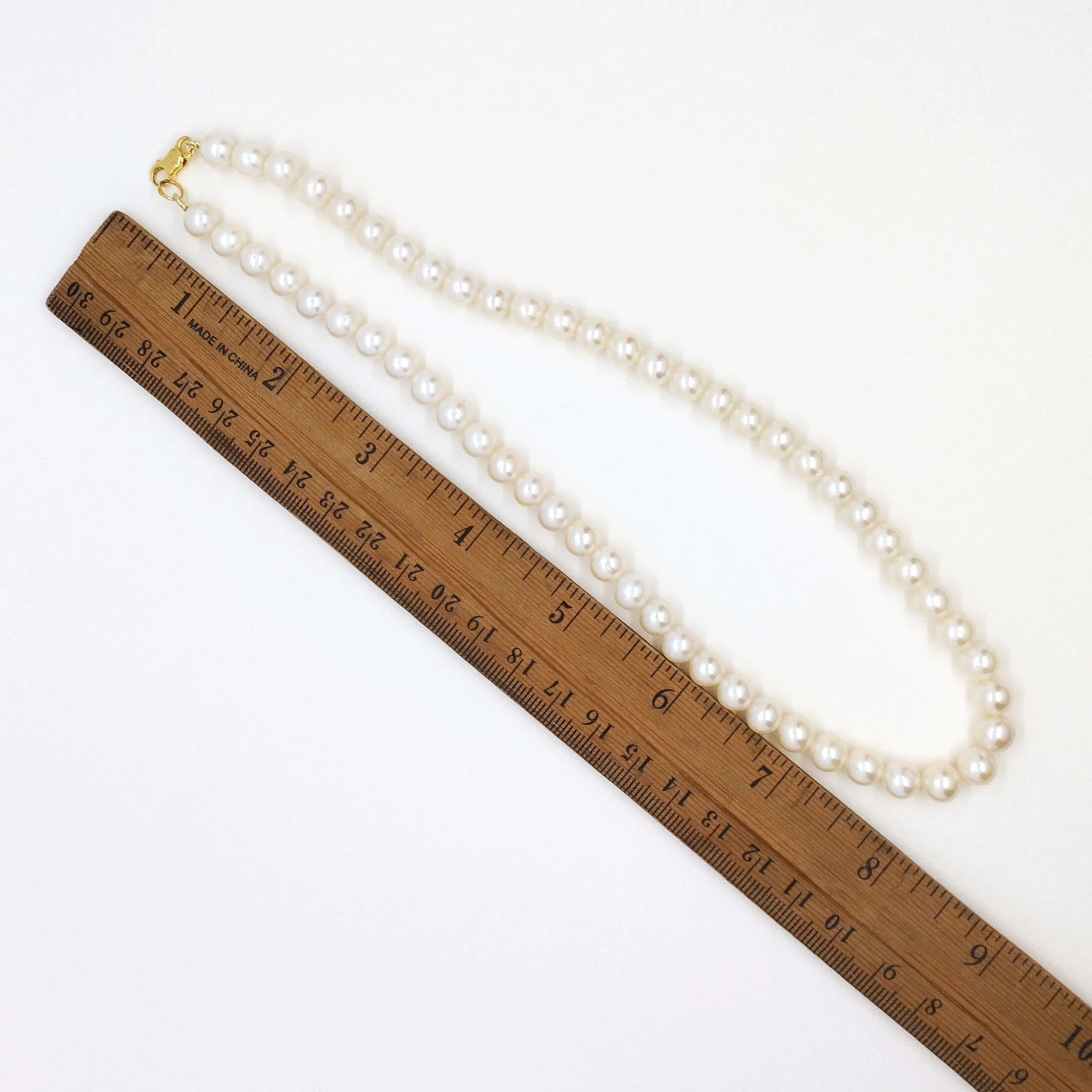 สร้อยคอไข่มุกน้ำจืดแท้ สีขาว 7mm. ยาว 16 นิ้ว ตัวล็อคทองคำแท้18k