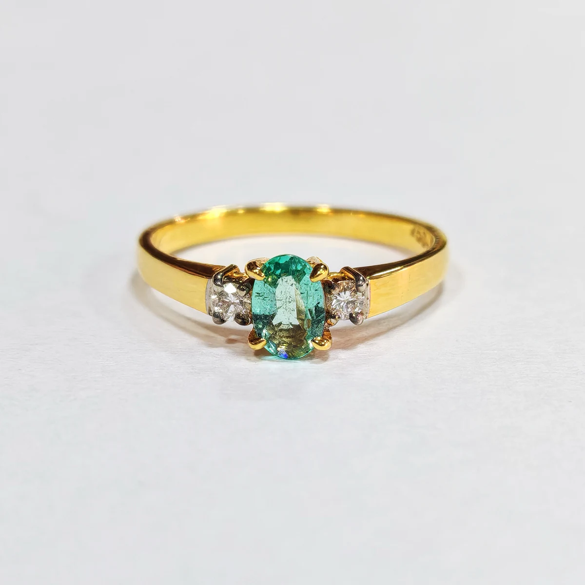 green sapphire 18k gold ring with diamond